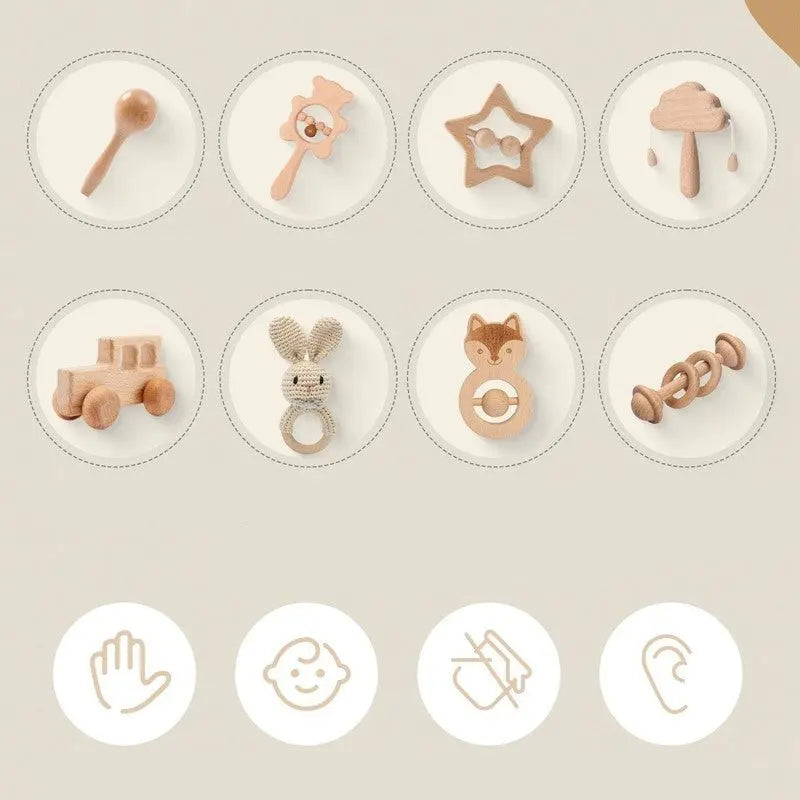 Le Coffret naissance hochets bois propose de charmants jouets en bois pour bébé comme des hochets, des anneaux de dentition, une voiture et un train. Les icônes mettent en valeur le toucher, la conception adaptée aux bébés, la durabilité et le son, le tout fabriqué de manière experte à partir de bois de première qualité.