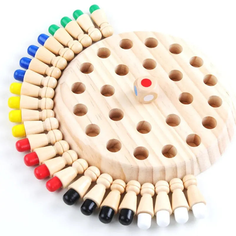 Un tableau de bois avec des épingles colorées ({{Jeu de pions Montessori}}).
