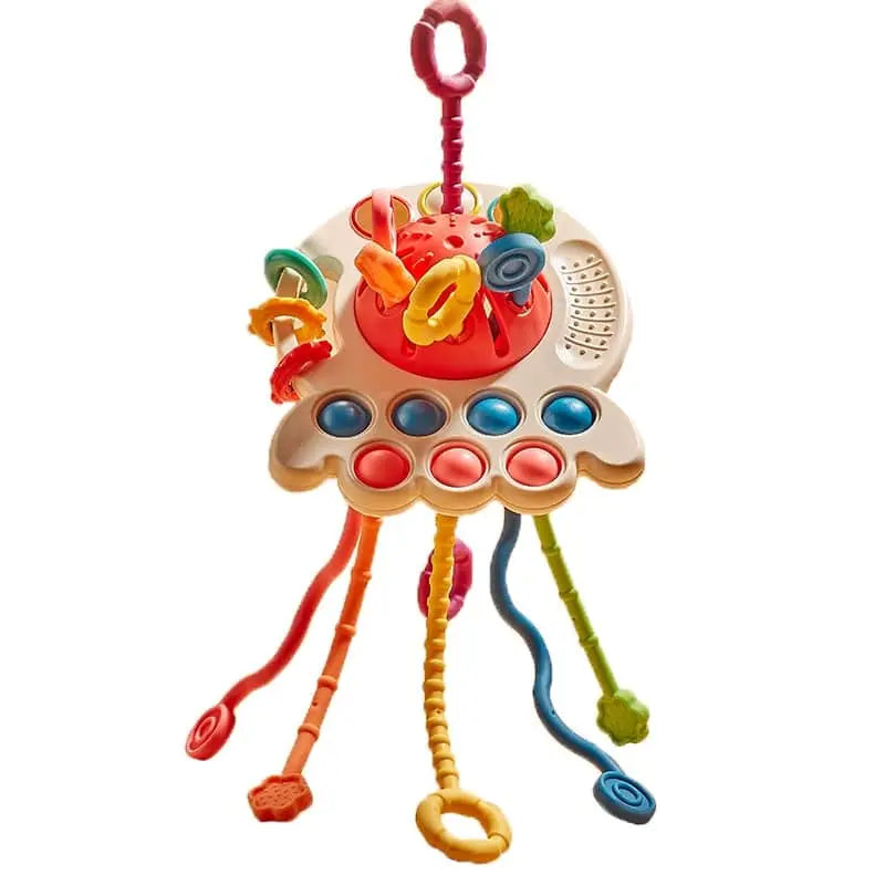 Un Jouet Sensoriel Bébé avec de nombreux boutons colorés.