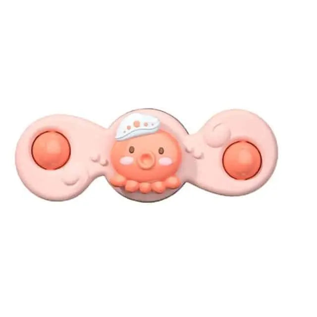 Un Spinner de Bain pour Baignoire en forme d'octopus rose sur un fond blanc.
