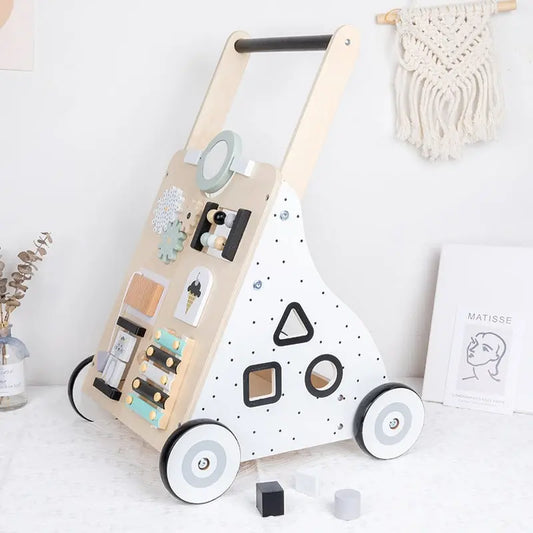 Un Trotteur pousseur bébé multi-activités en Couleurs pastel.