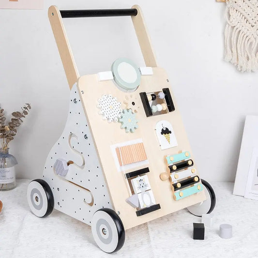 Trotteur pousseur bébé avec ses multiples activités