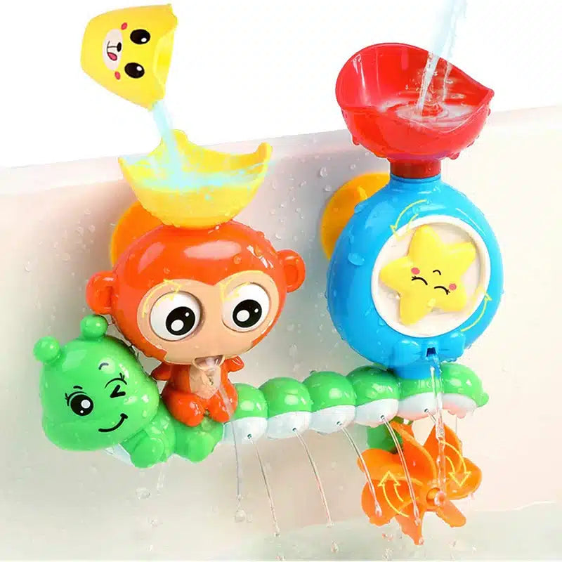 Un jouet de bain avec un singe et un oiseau dessus.