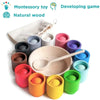 Un ensemble de Jouet en bois Montessori Boule et Tasse de Tri coloré et de cuillères dans un sac.