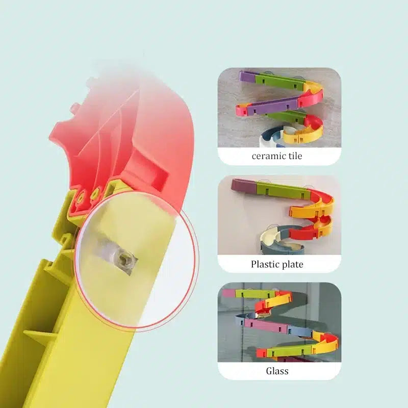 Photo d'un support en plastique de différentes couleurs, présentant un Jouet de Bain Tobogan Canard à Ventouse Baignoire.