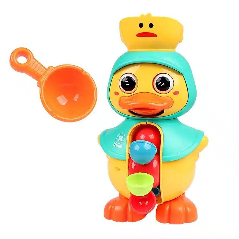 Un canard jouet avec une tasse et une cuillère à côté.