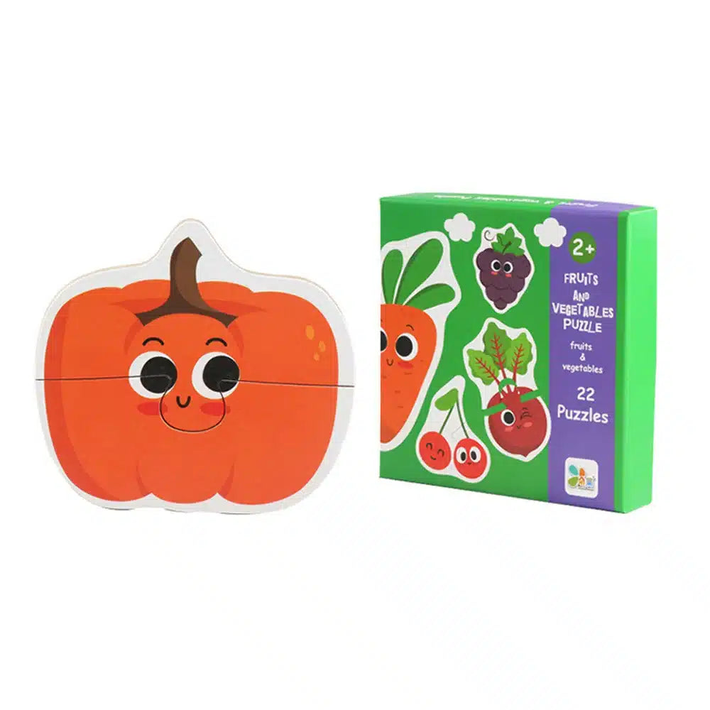 Une boîte contenant une citrouille et des légumes.