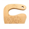 Un porte-ustensile en bois avec un dessin d'un dinosaure.