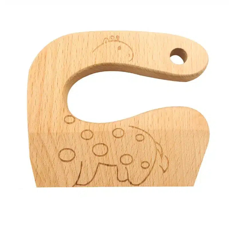 Un porte-ustensile en bois avec un dessin d'un dinosaure.