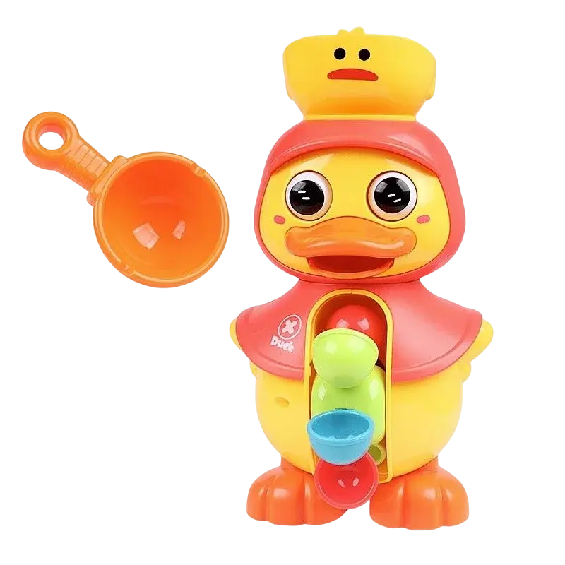 Un canard jouet avec une couronne et une cuillère.