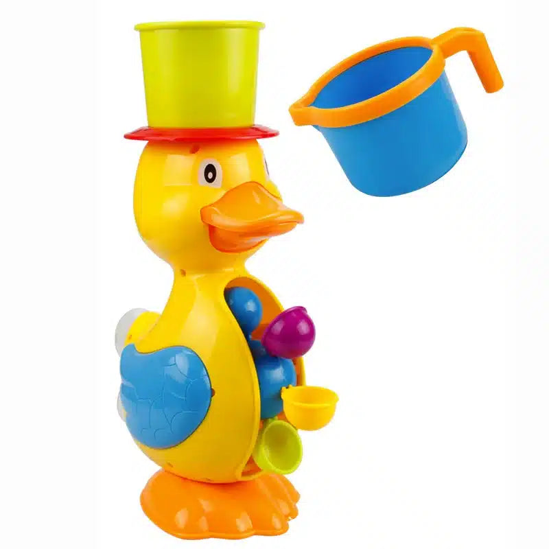 Un canard jouet avec un chapeau et une tasse.