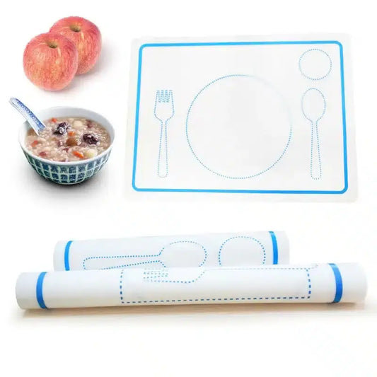 Découvrez le set de table inspiré de Montessori, comprenant des contours d'ustensiles, deux pommes, un bol de céréales et deux sets de table enroulés pour créer une expérience culinaire engageante.