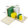 Un Cube d'Apprentissage des Volumes dans une boîte avec des mesures.