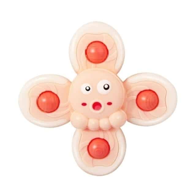 Un Spinner de Bain pour Baignoire en forme de jouet sur un fond blanc.