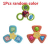 Un ensemble de jouets colorés avec différentes formes, couleurs et un Spinner de Bain pour Baignoire.