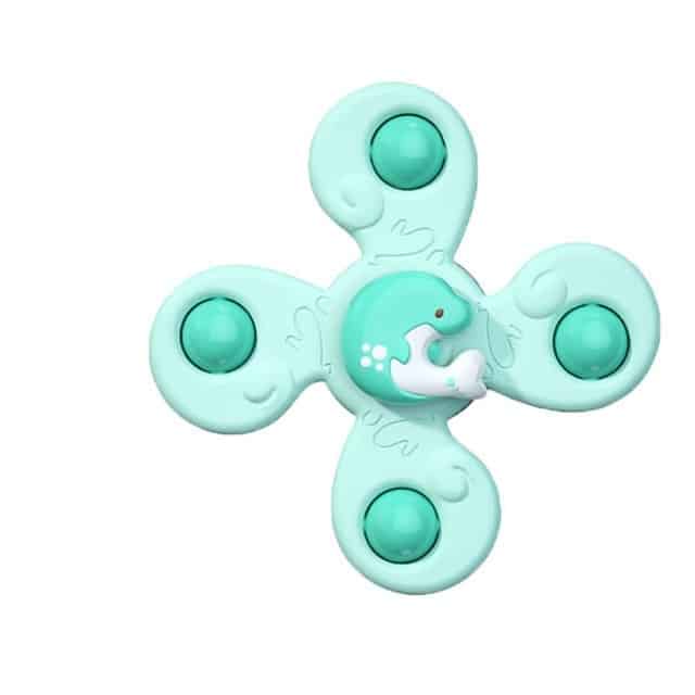 Le Spinner de Bain pour Baignoire est un fidget toy vert et blanc à pois blancs.
