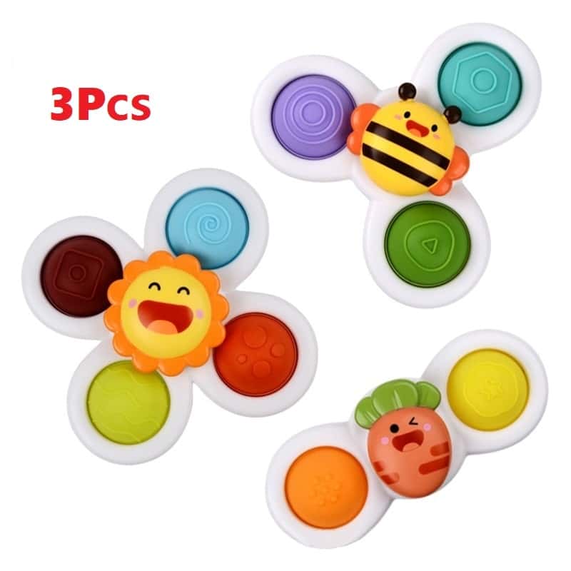 Trois Spinner de Bain pour Baignoire colorés avec une abeille, un lion et une girafe, adaptés à l'heure du bain.