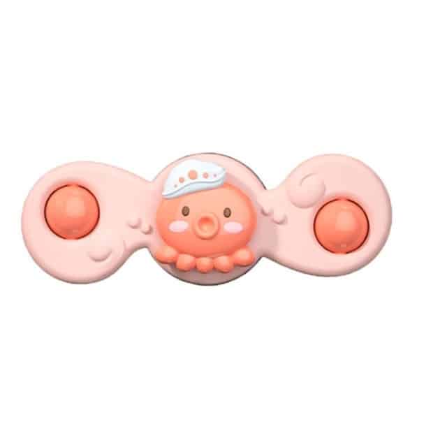 Un Spinner de Bain pour Baignoire en forme d'octopus rose sur un fond blanc.