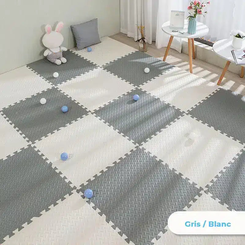 Tapis de Sol Épais Bébé à Deux Couleurs
Un Tapis de Sol Épais Bébé à Deux Couleurs dans un salon, avec deux couleurs grises et blanches.